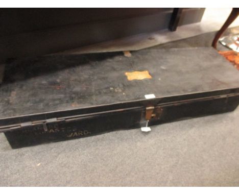 A tin trunk by Meyer, London, marked on a brass plaque 'Capt. Roland Norman, R.A.F.'  