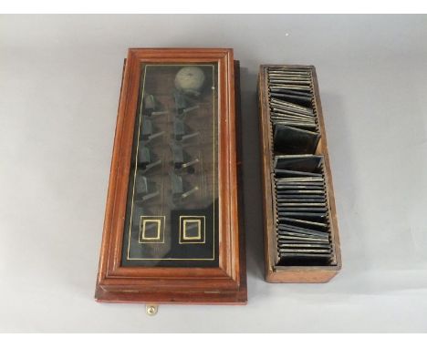 A box of collectables to include a country house servants bell box, a box of lantern slides of Alice in Wonderland by permiss