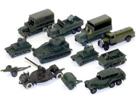 12 x Dinky Military; Tanks, Trucks and Guns, 2 x No. 152 Light Tanks, No. 151 Medium Tank (Damaged gun), NO. 161 AA Gun on Tr