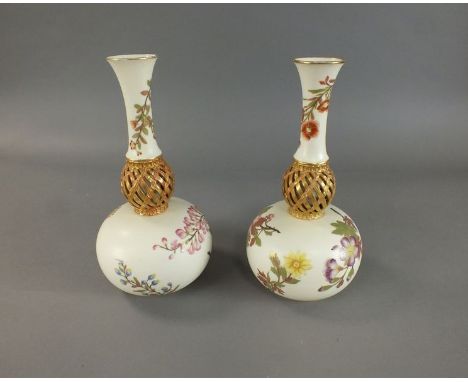 A pair of Royal Worcester blush ivory and reticulated vases painted with flowers shape 1158, late 19th century, printed facto