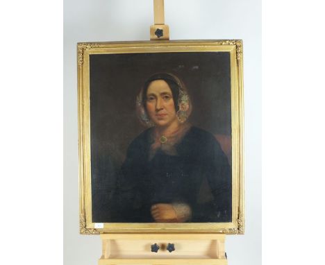 Victorian school, late 19th century, Portrait of a lady, half length wwearing a bonnet with flowers, oil on canvas, 75 x 62cm