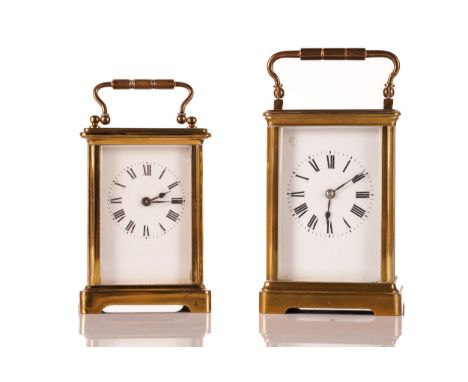 An early 20th-century French 8-day corniche carriage clock, with a simple Roman one-piece dial chiming the hours on a coil go