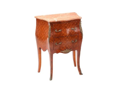 A French Louis XV-style two-drawer bombe petit commode, 20th century, with shaped rouge marble top above tulipwood trellis pa