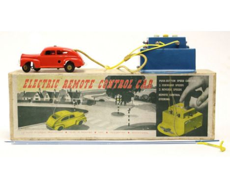 Nulli Secundus: A boxed Electric Remote Control Car set, red saloon car within the original box with leaflet.