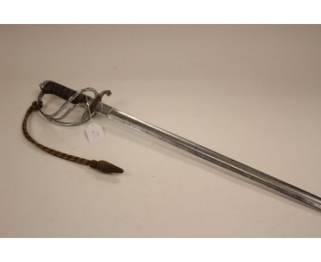 British Officers Sword. Plated finish overall. 90cm blade with Proof mark and traces of etched decoration. Spine of blade num