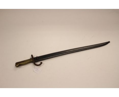 French 1866 pattern Chassepot Bayonet and scabbard with matching serial numbers "1854". Plus one without scabbard. (2)