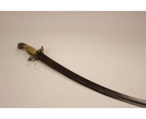 A 19th Century Officers Cavalry Sword. 75cm curved single edged blade. Brass crossguard with traces of original gilt finish. 