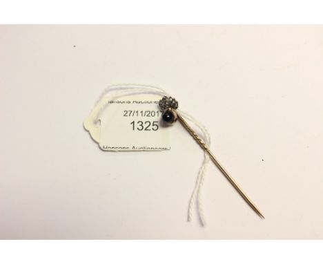 **REOFFER IN A&C DEC £40-£60** WW2 British Royal Artillery Sweetheart Stick Pin with a cabachon sapphire and diamond.