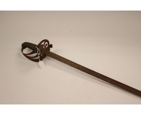 A Victorian British Army Officers Sword. Shagreen covered grip. Flaming Grenade to guard. No scabbard. Rusted overall.