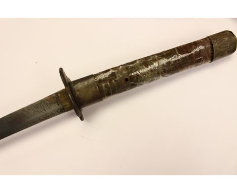 WW2 Imperial Japanese Army Katana Sword. 63cm signed blade. Comes with a non original "Home made" iron Tsuba and grip. Along 