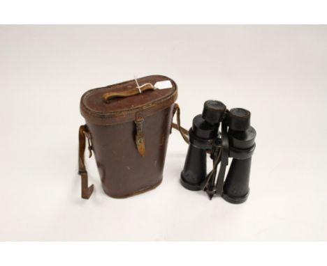 WW2 British Barr and Stroud 7 x Binoculars. Serial number 31638. Broad Arrow marked. Complete with neck sling, leather lens c