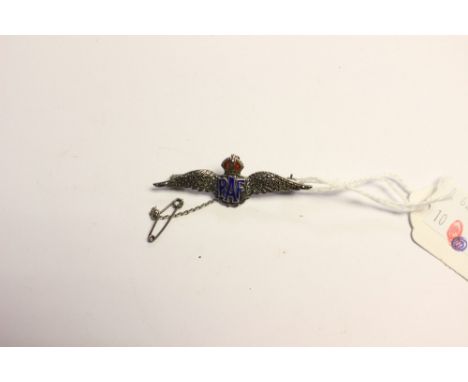 An RAF silver and marcasite 'sweetheart' brooch in the form of a pair of Pilots wings. Colured enamel details. Complete with 