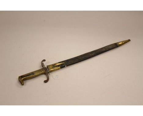 Imperial German S71 Mauser Bayonet. Brass grip with recurved crossguard marked "VII GB II 1234." Complete with scabbard marke