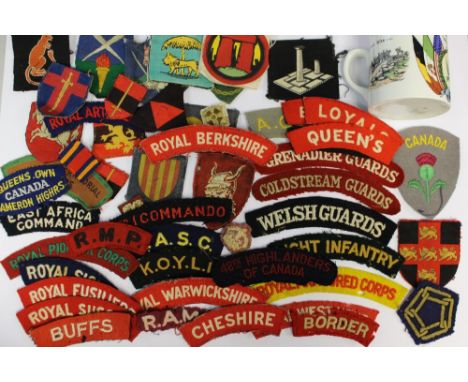 A collection of WW2 British cloth shoulder titles inc No1 Commando, Light Infantry, Royal Armoured Corps, Welsh Guards, Royal