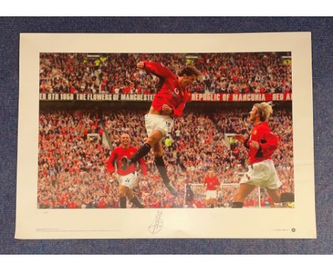 Ruud Van Nistelrooy Man United signed 16 x 23 big blue tube print coloured photo. Photo shows United's Prolific striker leapi