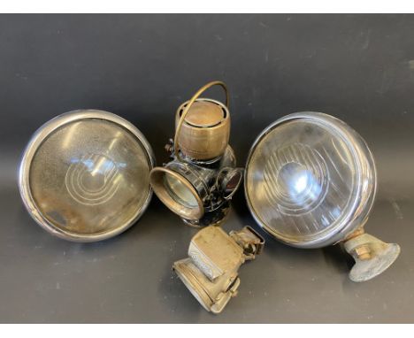 A pair of Lucas King of The Road headlamps, a black enamel and brass Lucas no.635 handheld lamp etc. 