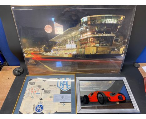 A framed and glazed collage of original RAC epherera, a Ferrari advertising mirror and a large scale Le Mans print. 