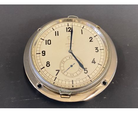 A Zenith eight day car clock with secondary dial, appears restored. 