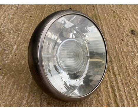 A large Bosch nickel plated headlamp, approx. 11 1/4" diameter.