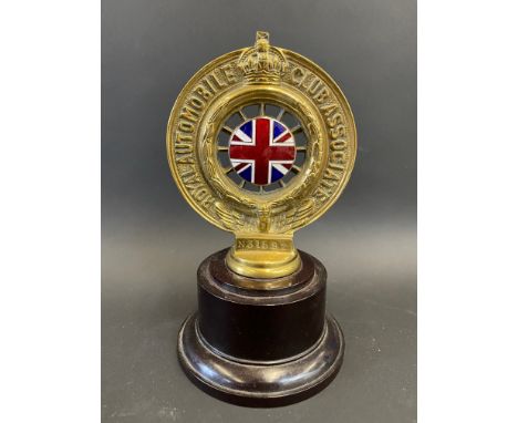 An RAC Associate car badge with good enamel centre by Collins of London, no. N31592