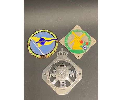 A German enamel car badge Ruhrland Automobile and Yacht Club Essen 1927, a Holland Touring Club badge and one other. 