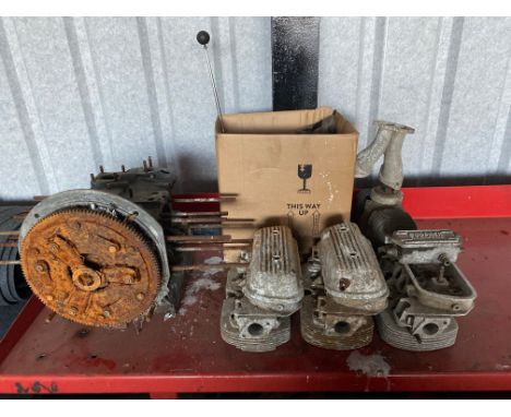 An autojumbler's lot including a partial helicopter engine.