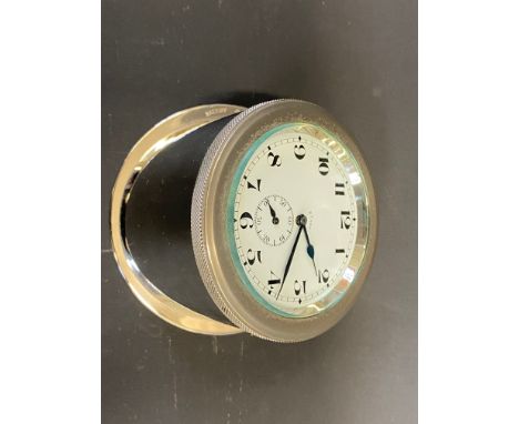 A French sloping backed eight day car clock. 