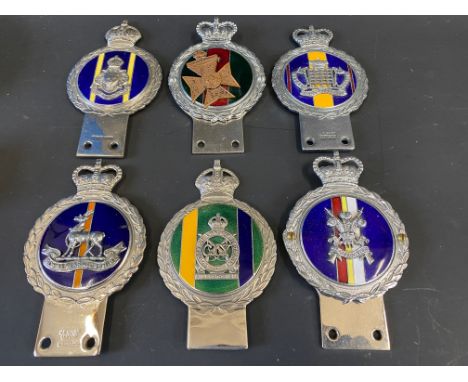 Three Gaunt enamel regimental car badges to include The Royal Gloucestershire Hussars and three others. 