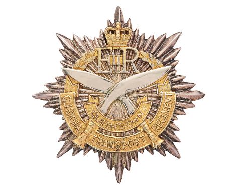 Gurkha Transport Regiment Officers pouch belt plate circa 1965-92.Good die-cast silver plated star mounted with gilt laurel s