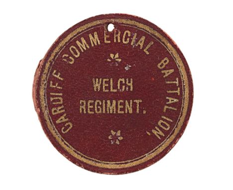 Cardiff Commercial Battalion Welch Regiment Kitcheners Army Official WW1 cardboard cap badge.Very scarce circular stout maroo