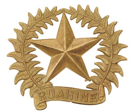 New Zealand. 17th (Ruahine) Regiment  helmet plate.Good scarce die-stamped brass fern sprays with RUAHINE scroll at the base;