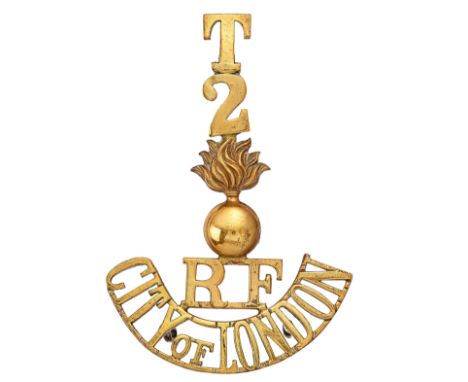 T / 2 / grenade / RF / CITY OF LONDON brass post 1908 Royal Fusiliers shoulder title.Good scarce one piece example. Three loo