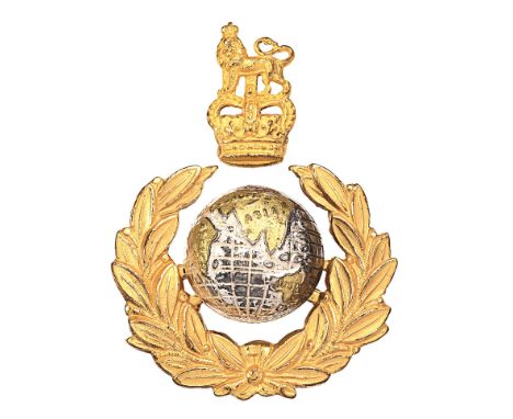 Royal Marines post 1953 Officers cap badge.Fine die-stamped silvered Globe and rich gilt laurels surmounted by separate Royal