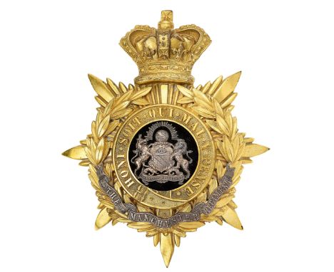 Manchester Regiment Victorian Officers helmet plate circa 1881-1901.Fine die-stamped gilt crowned star mounted with laurel sp