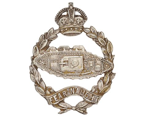 Royal Tank Corps Officers post 1924 beret badge.Fine die-cast example. Silvered crowned laurel sprays bearing scroll inscribe