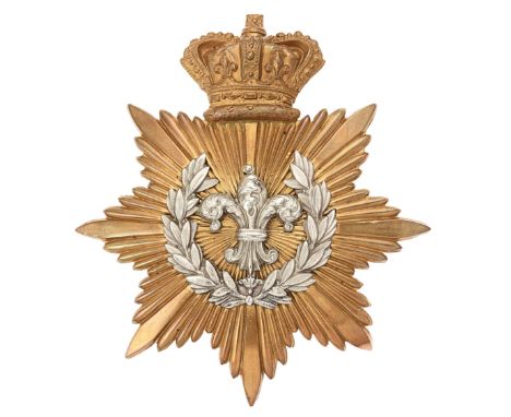 4th VB Manchester Regiment Victorian Officers helmet plate circa 1888. Good rare short lived die-stamped gilt metal crowned s