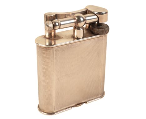 DUNHILL: A NICKEL SILVER TABLE LIGHTER with patent no. 390107,  circa 1940's, 10cm high