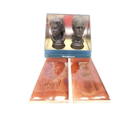 A boxed Wedgwood Royal Silver Wedding 1947-1972 commemorative busts in black basalt of Queen Elizabeth II and The Duke of Edi