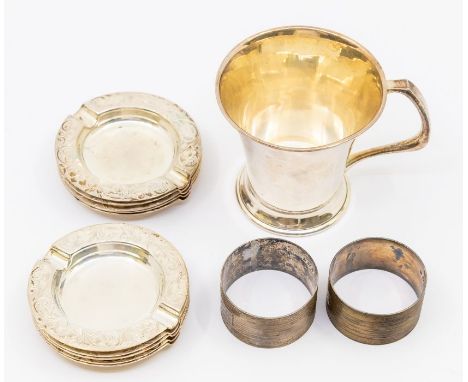 A collection of silver to include; an Elizabeth II silver christening mug, Bert Gordon, Birmingham, 1971, a pair of Birmingha