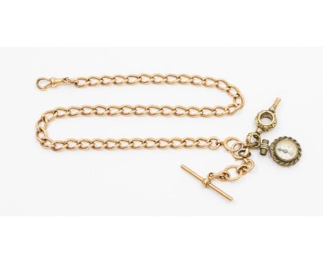 An early 20th century 15ct gold watch chain, comprising oval open links, each approx 10 x 5mm, toggle clasp and bolt clasp al