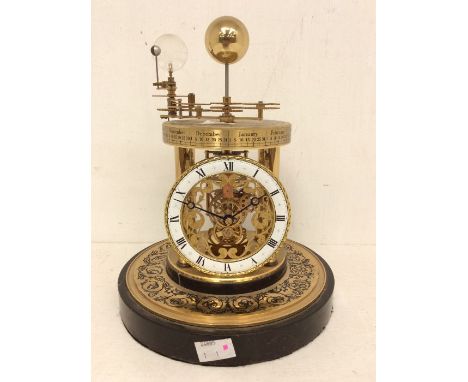 Hermle Astrolabium quartz mantel clock, serial number A2987 with 3&frac12;" dial, moon hands on a marble type case. Dimension