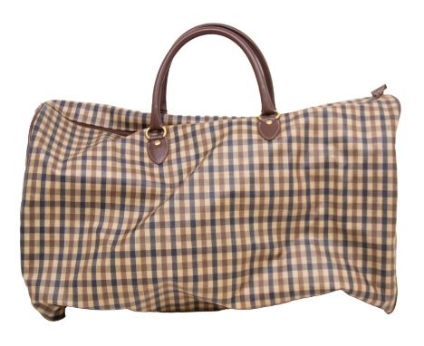 An Aquascutum weekend bag in traditional Aquascutum print in coated canvas with leather trim, complete with original dust bag