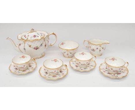 A Royal Crown Derby 'Royal Antoinette' pattern part tea service to include: teapot, milk jug, sugar basin and 4 cups and sauc