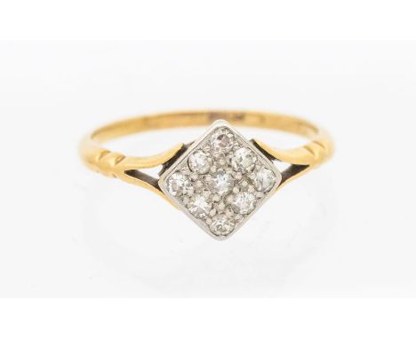 A 1930's diamond and 18ct gold ring, comprising a squared platinum top set with small diamonds, width approx 8mm, split shoul