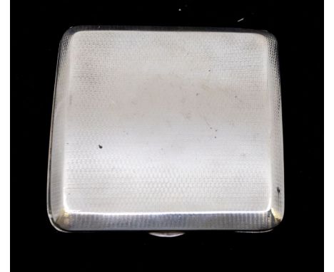 A George V engine turned silver square cigarette case, gilt interior, hallmarked William Base & Sons, Birmingham, 1922. Weigh