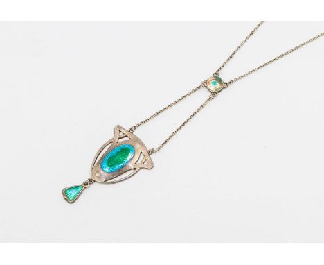 A Charles Horner silver and enamel pendant, comprising a central motif with peered decoration, the centre with a green and tu
