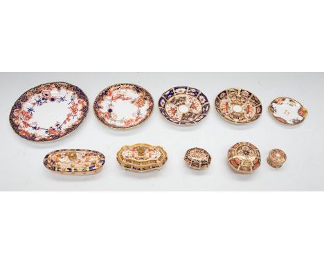 Collection of Royal Crown Derby early 20th century china items, to include saucers, plate, rouge pot, miniature toothbrush po
