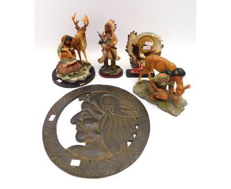 Three Native American resin figures together with an American flag, an eagle mantel clock in resin and a round wooden Native 