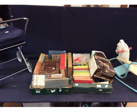 A collection of children's books i.e. Thomas the Tank Engine, Beatrix Potter, and other books, a Rupert the Bear tea set, mic