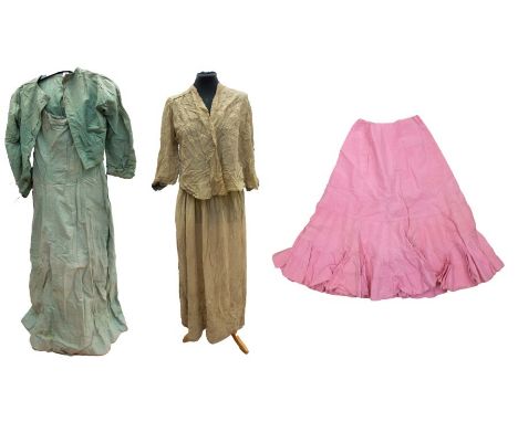 A glazed cotton 1900s skirt in candy pink. The deep frill on the skirt is pin-tucked, there is pie-crust pleating round the h
